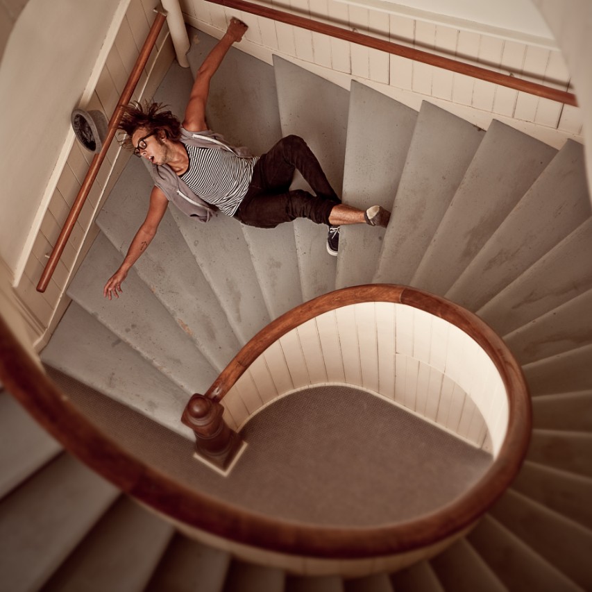 woman falling down the stairs